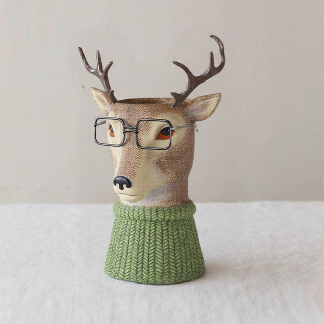 resin brown deer shaped planter decorative vase on the table