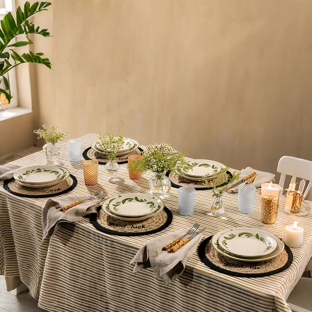 round jute woven smiling face table coaster on the dining table