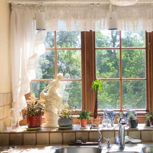 round storage tray by window