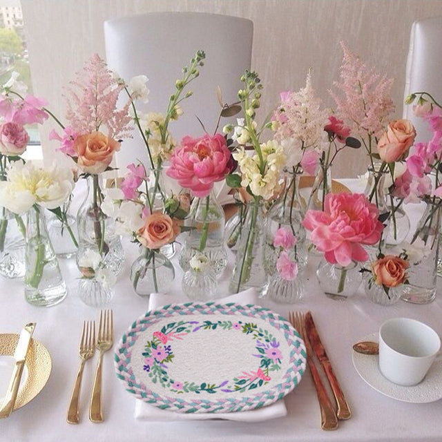 rustic floral woven oval placemat on the dining table