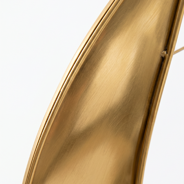 sailboat sculpture golden sail detail