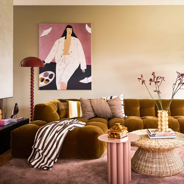 sateen finish bow shaped throw pillow on sofa