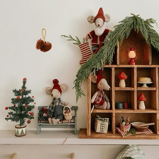 scandinavian pinecone wall decor as christmas decor