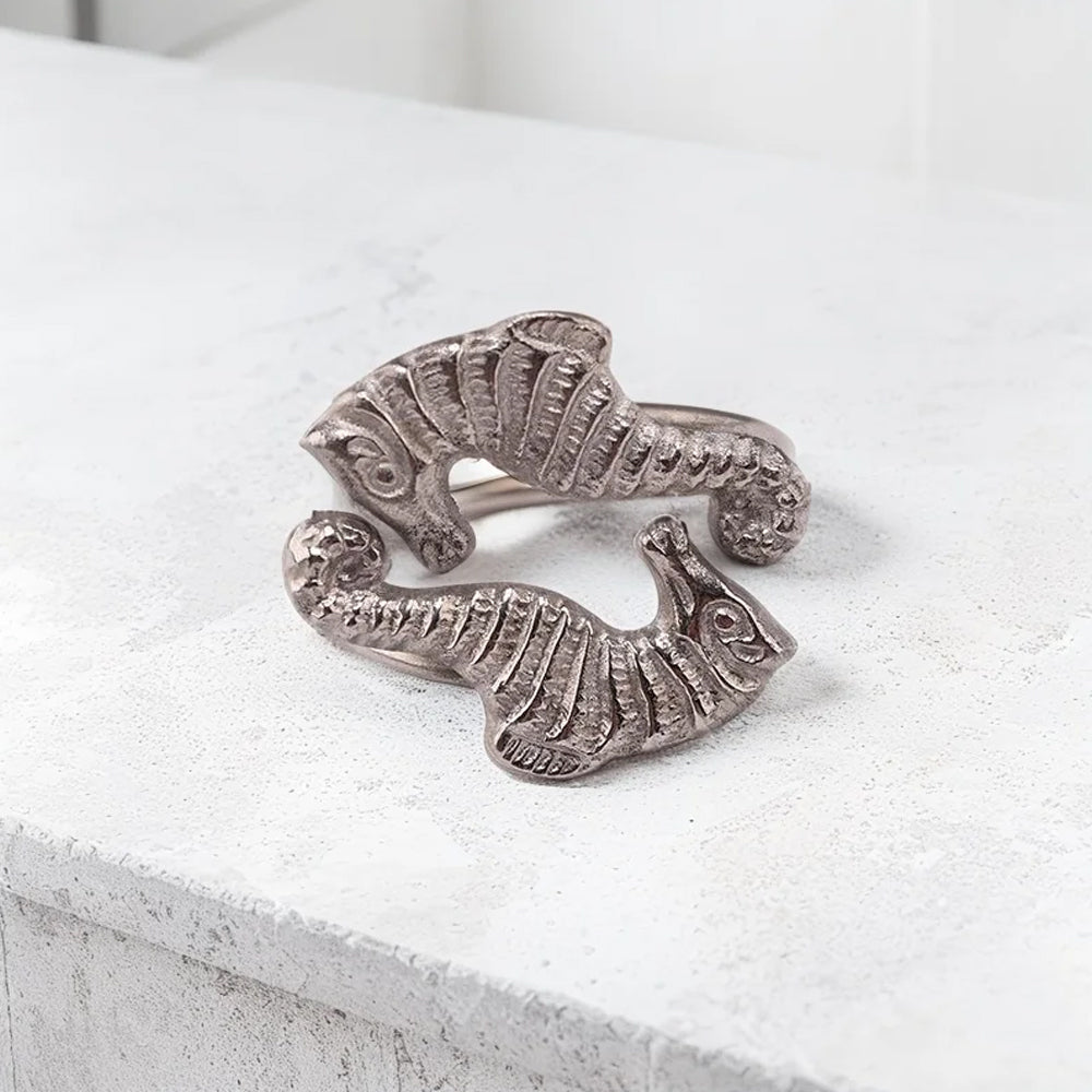 seahorse napkin ring holder on the table