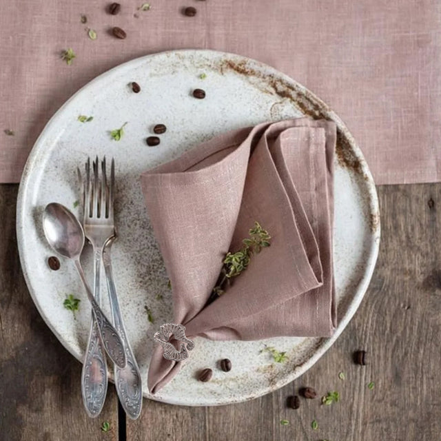 seahorse napkin ring holding cloth napkin