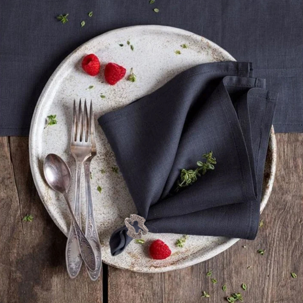 seahorse napkin ring holding cloth napkin