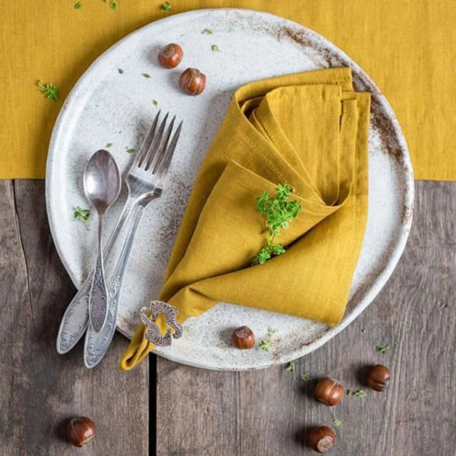 seahorse napkin ring holding cloth napkin