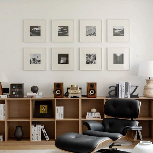 set of 2 MDF letter shaped decorative bookends on the cabinet