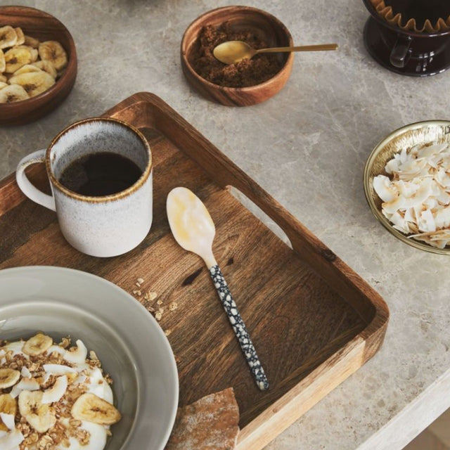 set of 2 natural mother of pearl dessert spoons in the tray