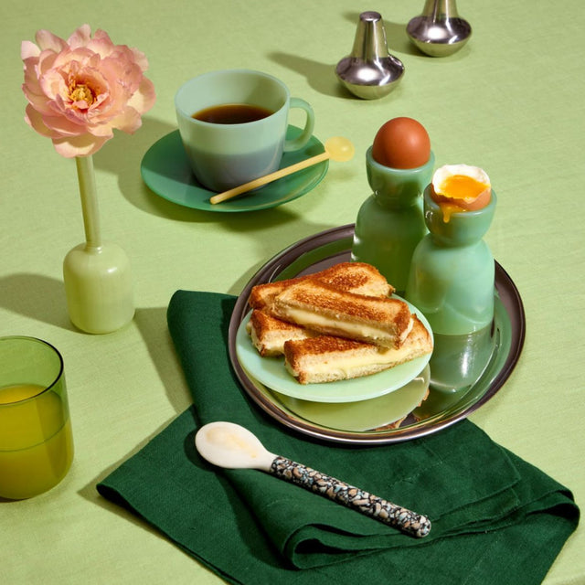 set of 2 natural mother of pearl dessert spoons on the table