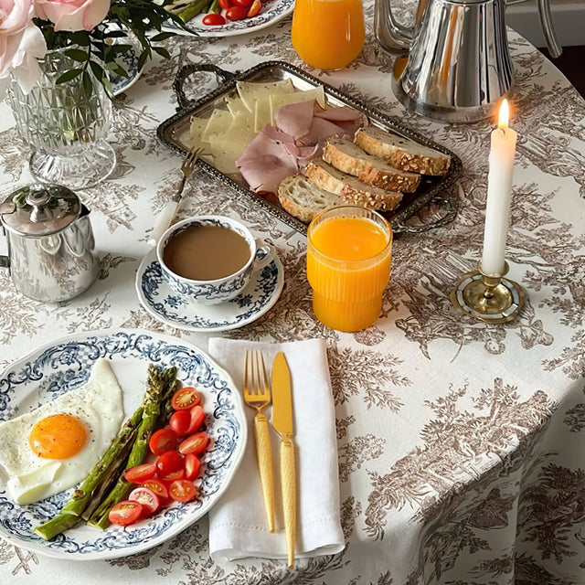 set of 3 stainless steel golden tableware on the dining table