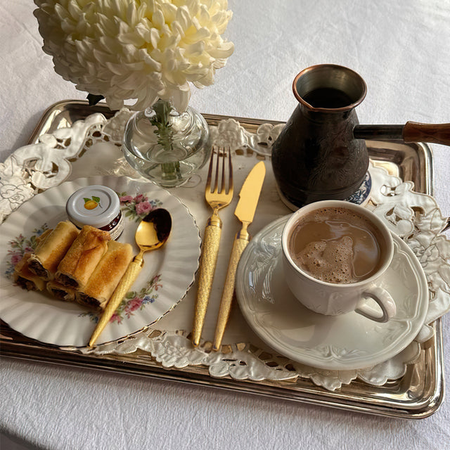 set of 3 stainless steel golden tableware on the tray