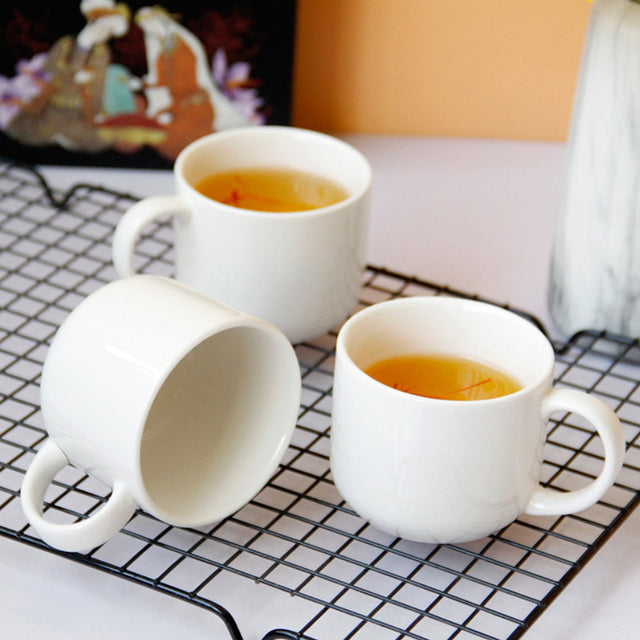 set of 6 white ceramic stacking coffee mugs with black metal details