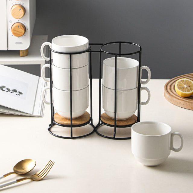 set of 6 white ceramic stacking coffee mugs with black metal details