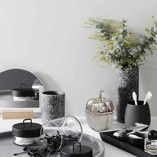 silver pumpkin shaped decorative storage jar in home decor