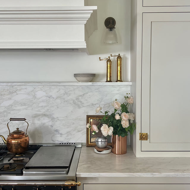 stainless steel mechanical apple baking cooking kitchen timer in the corner