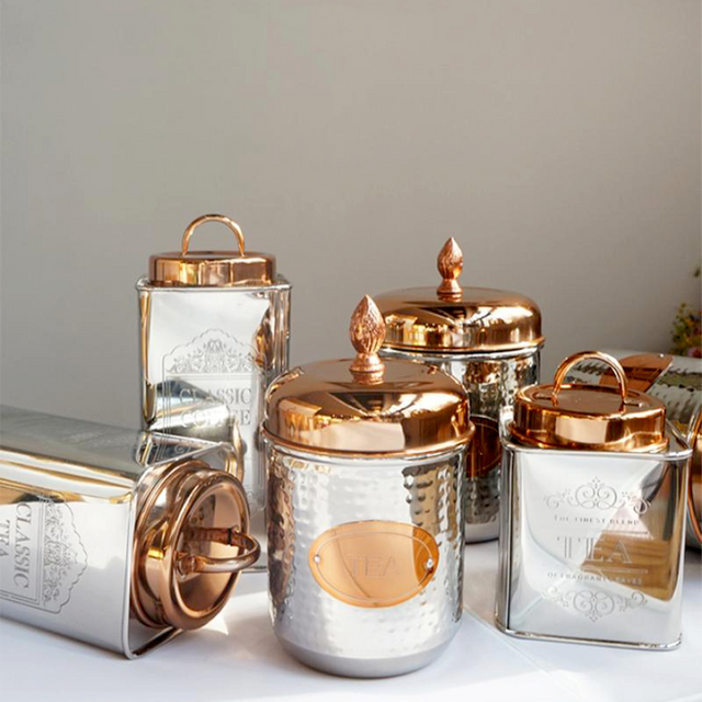 stainless steel sealed coffee storage canister with a pineapple handle