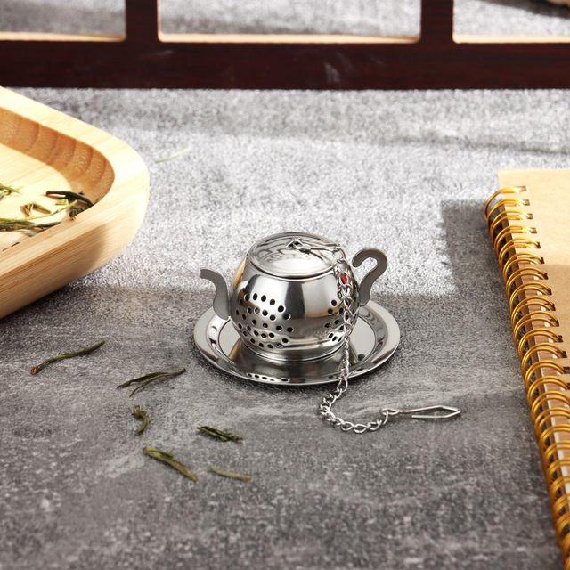 stainless steel tea infuser on the table