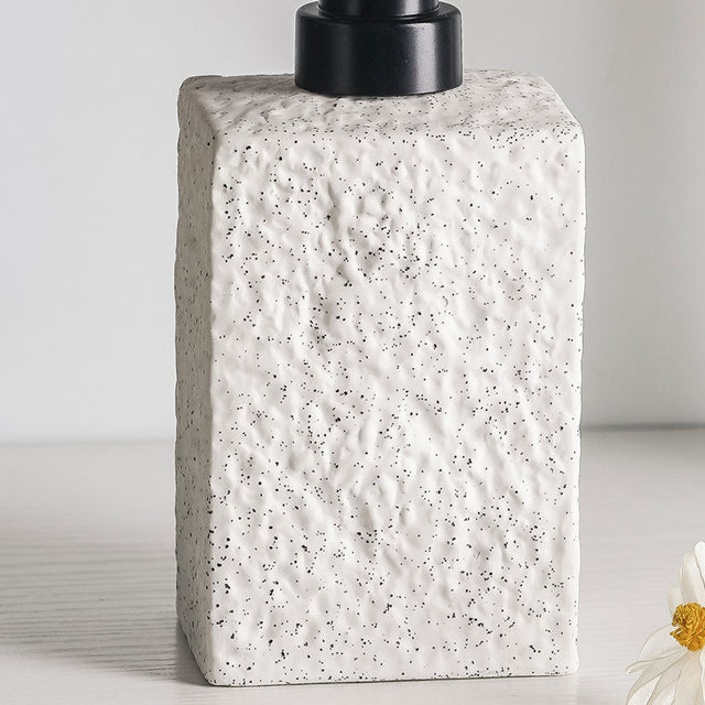 stone-textured-ceramic-liquid-soap-dispenser-close-up-06171