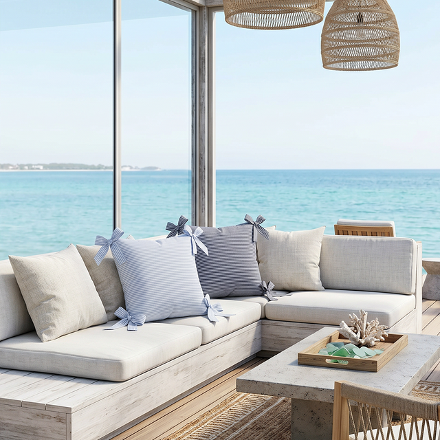 striped bow pillows on beachfront patio sectional