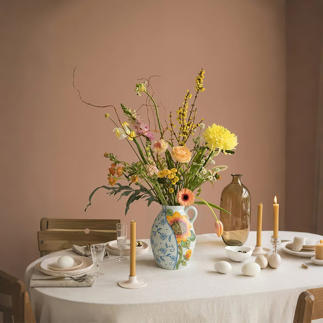 sunflower themed ceramic vase on the dining table