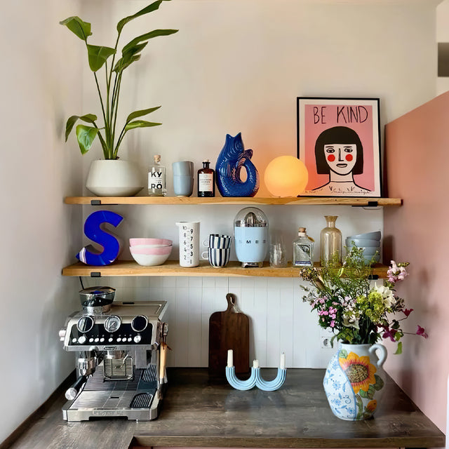 sunflower themed ceramic vase on the shelf