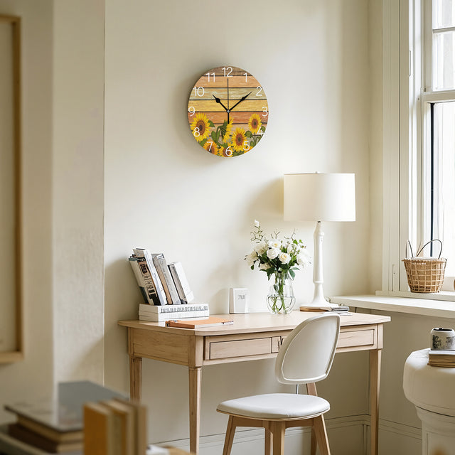 sunflower wall clock hanging above the desk