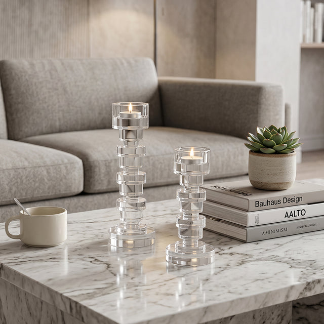 tall and short crystal candle holders on coffee table