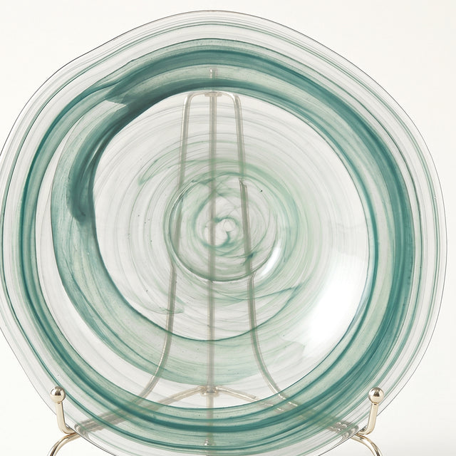teal round glass plate front view on metal stand