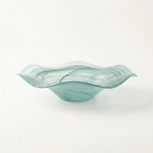 teal wavy glass bowl side view close up