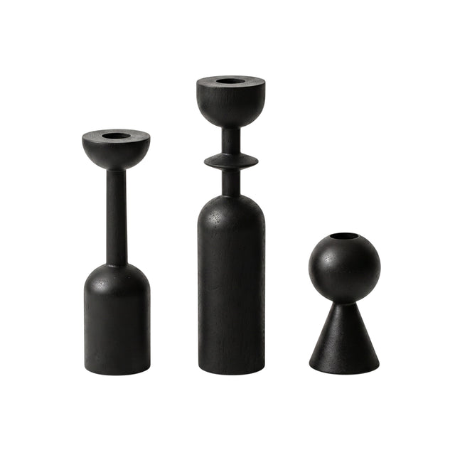 three black geometric wooden candle holders