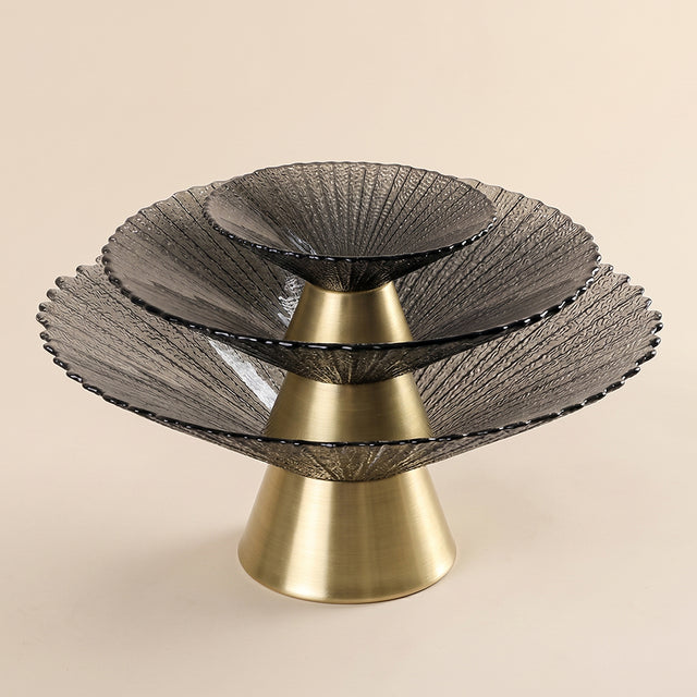 three stacked black bowls