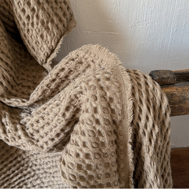 throw blanket off brown detail