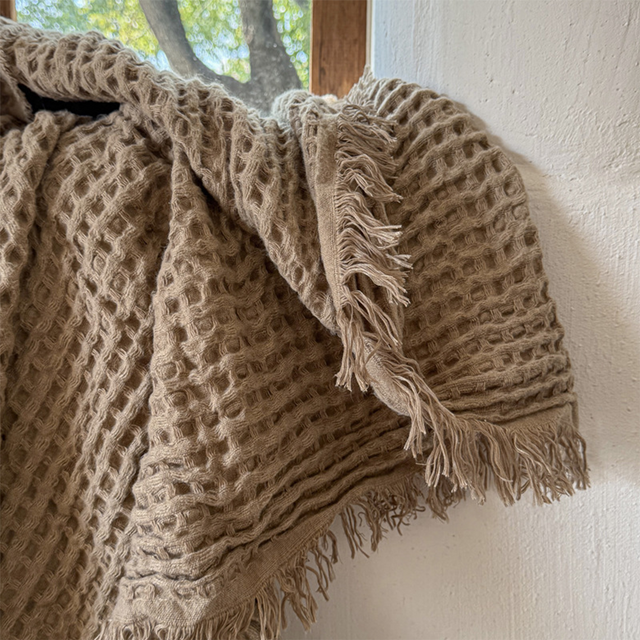 throw blanket off brown detail