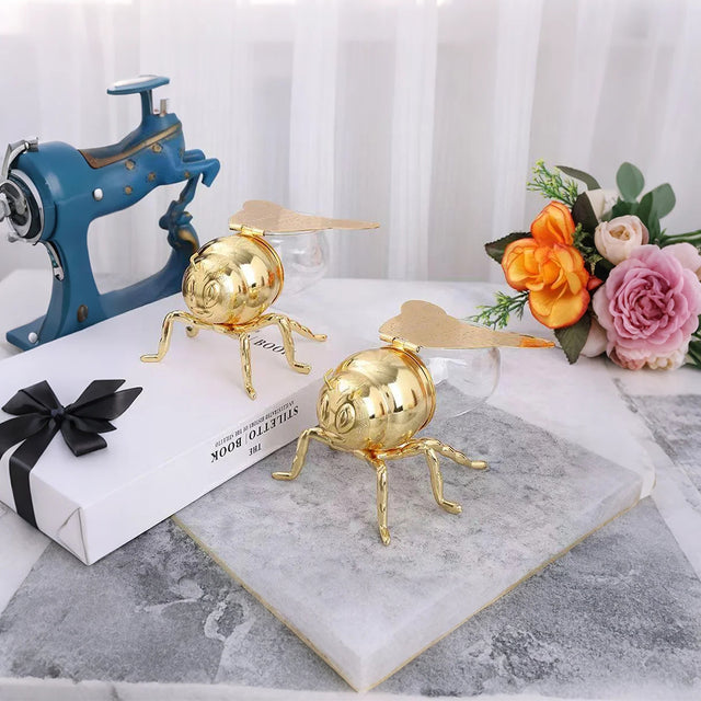 vintage bee themed honey jar with spoon decorative piece on the table