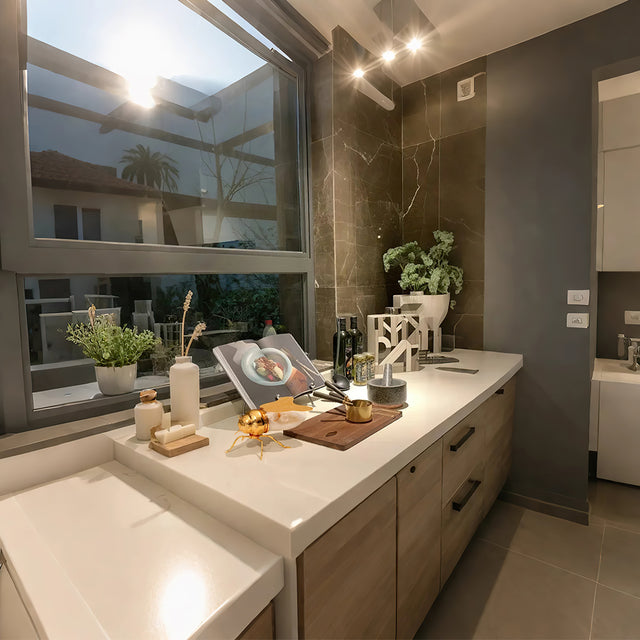 vintage bee themed honey jar with spoon in the kitchen