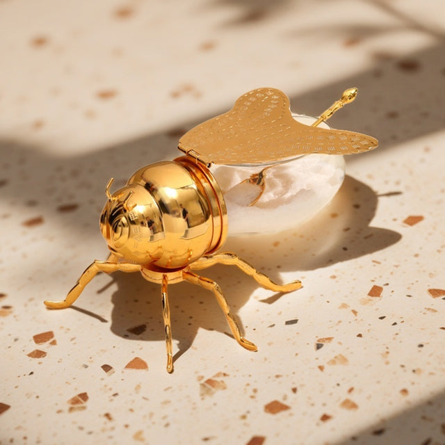 vintage bee themed honey jar with spoon storing seasoning