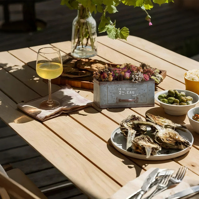 vintage blue iron drawer style flower pot on the dining room