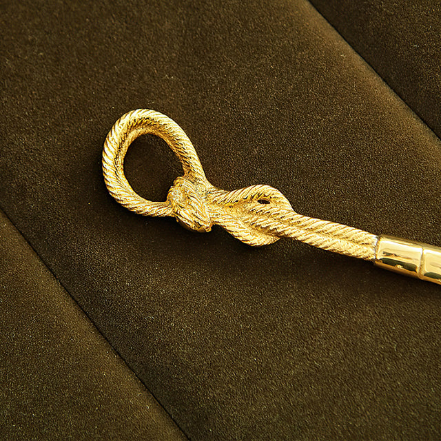 vintage brass golden shoe horn details