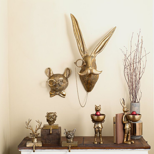 vintage bronze resin animal wall decor above the table