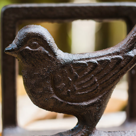 vintage cast iron brown bird shaped napkin holder cookbook stand and bookend details