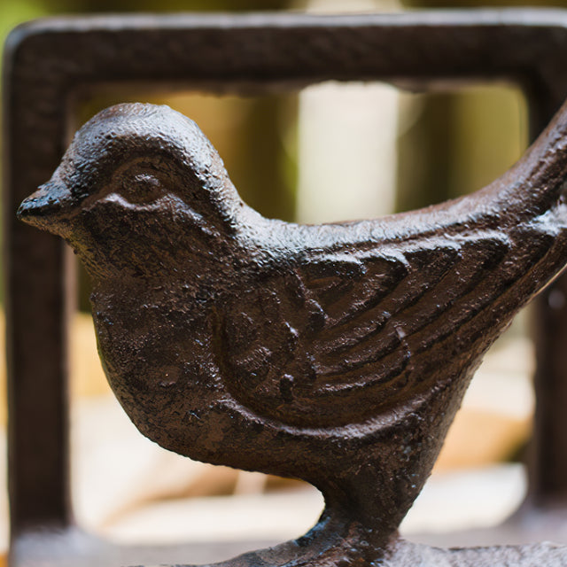 vintage cast iron brown bird shaped napkin holder cookbook stand and bookend details