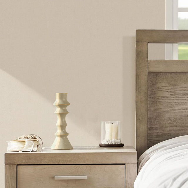 vintage ceramic bicolor decorative candle holders on the bedside table