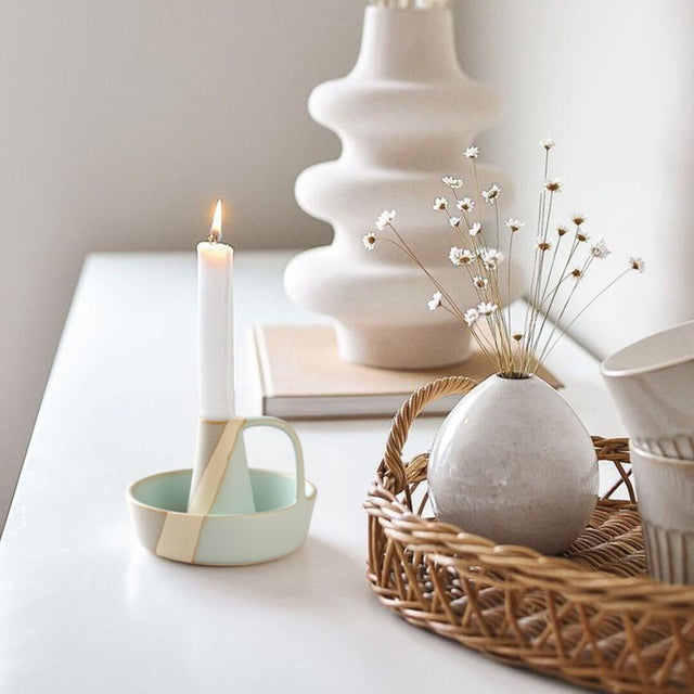 vintage ceramic bicolor decorative candle holders on the table