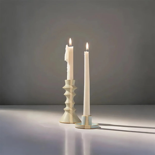 vintage ceramic bicolor decorative candle holders on the table