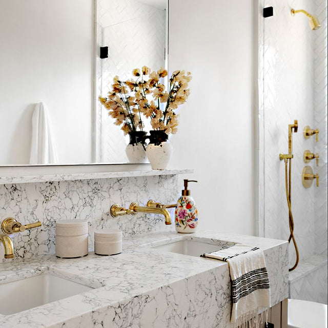 vintage floral ceramic soap dispenser near the sink