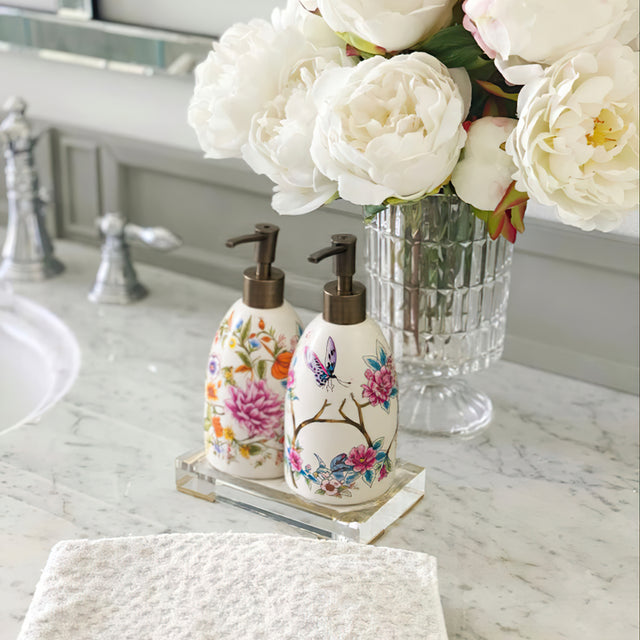 vintage floral ceramic soap dispenser on the washstand