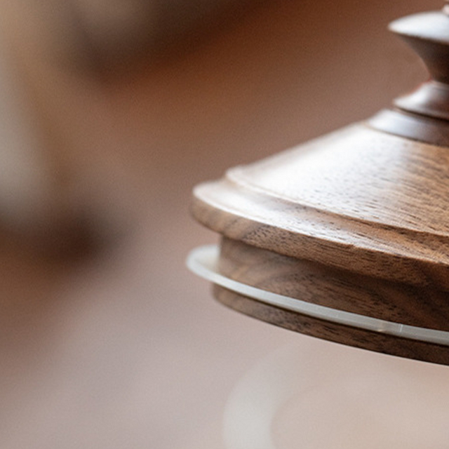 vintage-glass-storage-jar-with-wooden-lid-close-up-072201