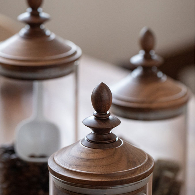 vintage-glass-storage-jar-with-wooden-lid-close-up-072203