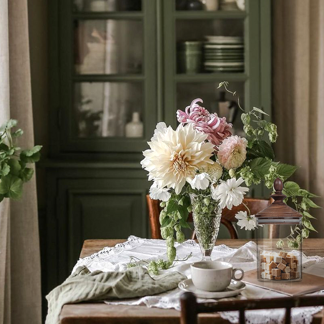 vintage-glass-storage-jar-with-wooden-lid-scene-072203